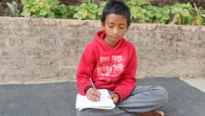 Anil Bhujel, 10 ans, qui vient du district de Sindhupalchwok au Népal